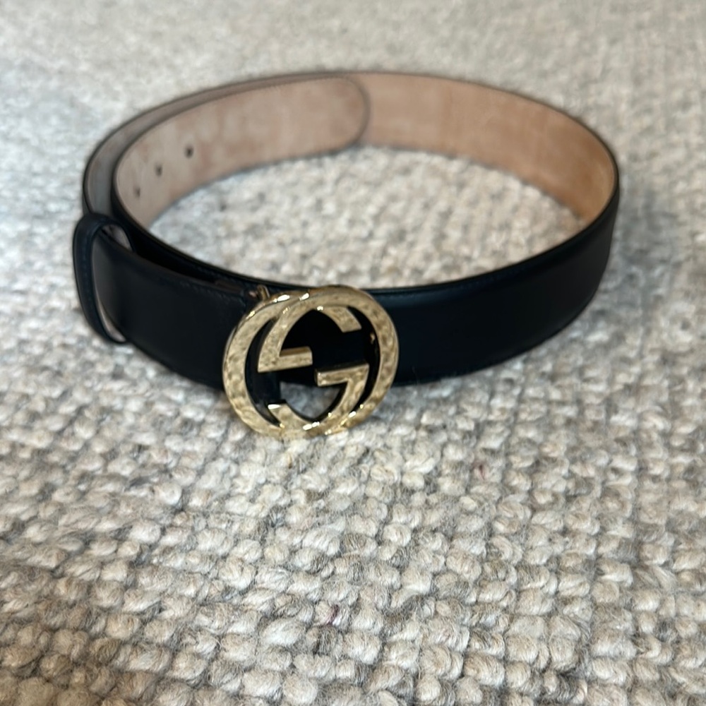 Gucci Black and Gold Belt with Iconic GG Buckle